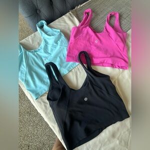 lululemon athletica Crop Tops in Black, Pink, and Light Blue